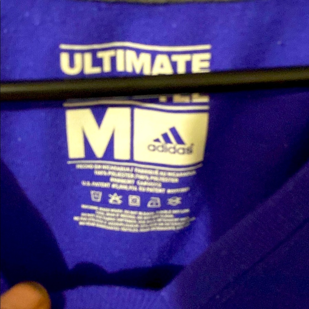 Woman adidas’s blue shirt. Active wear